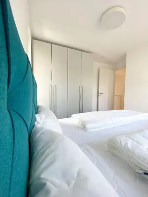 Ein Bett oder Betten in einem Zimmer der Unterkunft Strandläufer 1