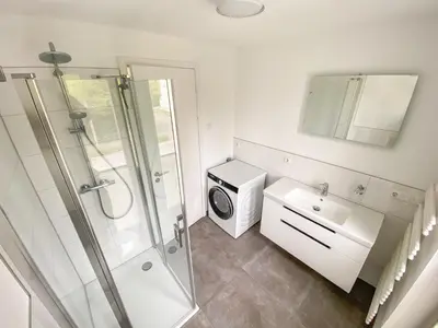 Ein Badezimmer in der Unterkunft Strandläufer 1