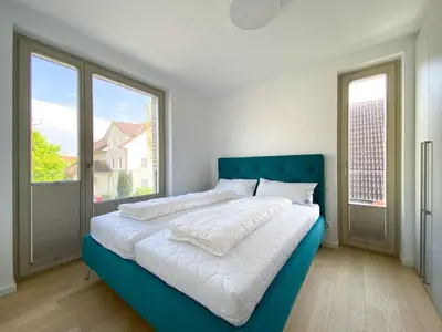 Ein Bett oder Betten in einem Zimmer der Unterkunft Strandläufer 2