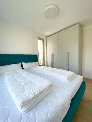Ein Bett oder Betten in einem Zimmer der Unterkunft Strandläufer 2