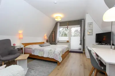 Ein Bett oder Betten in einem Zimmer der Unterkunft Am Waldesrand
