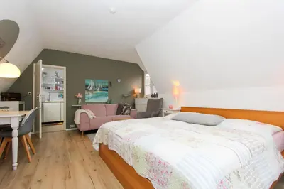 Ein Bett oder Betten in einem Zimmer der Unterkunft Am Waldesrand