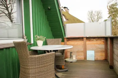 Ein Balkon oder eine Terrasse in der Unterkunft Am Waldesrand