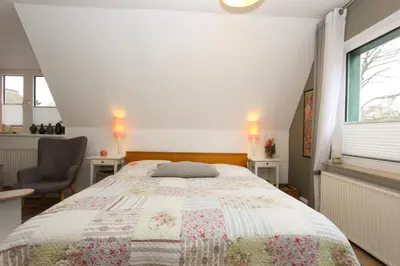 Ein Bett oder Betten in einem Zimmer der Unterkunft Am Waldesrand