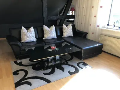 Ein Sitzbereich in der Unterkunft Ferienwohnung OstseeStrandLäufer 2