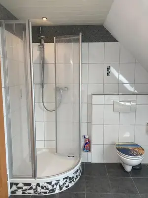Ein Badezimmer in der Unterkunft Ferienwohnung OstseeStrandLäufer 2