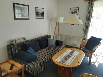 Ein Sitzbereich in der Unterkunft Haus Seeschwalbe, Whg3
