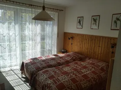 Ein Bett oder Betten in einem Zimmer der Unterkunft Haus Seeschwalbe, Whg3