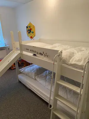Ein Bett oder Betten in einem Zimmer der Unterkunft Freistehendes Einfamilienhaus mit Boddenblick Nähe Ostsee