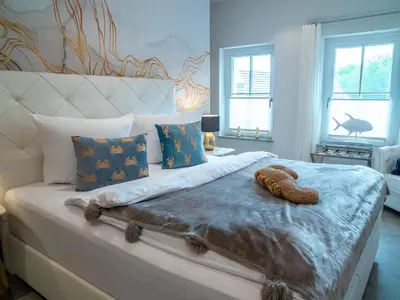 Ein Bett oder Betten in einem Zimmer der Unterkunft 