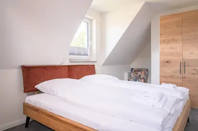 Ein Bett oder Betten in einem Zimmer der Unterkunft Parkblick Parkblick 2