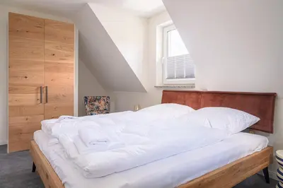 Ein Bett oder Betten in einem Zimmer der Unterkunft Parkblick Parkblick 1
