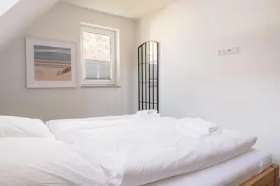 Ein Bett oder Betten in einem Zimmer der Unterkunft Parkblick Parkblick 1
