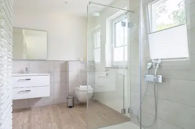Ein Badezimmer in der Unterkunft Parkblick Parkblick 3