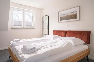 Ein Bett oder Betten in einem Zimmer der Unterkunft Parkblick Parkblick 3