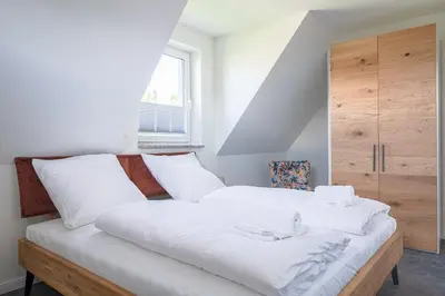 Ein Bett oder Betten in einem Zimmer der Unterkunft Parkblick Parkblick 4