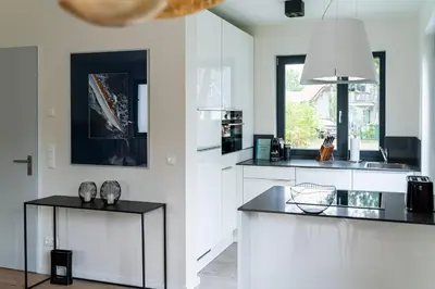 Küche/Küchenzeile in der Unterkunft Haus Kornrade -5 Sterne mit Sauna & Kamin