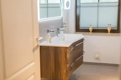 Ein Badezimmer in der Unterkunft Ferienwohnungen Haus am Strand