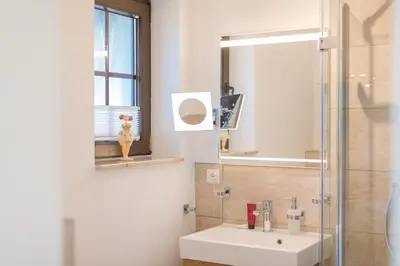 Ein Badezimmer in der Unterkunft Ferienwohnungen Haus am Strand