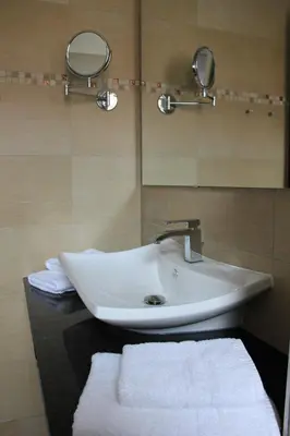 Ein Badezimmer in der Unterkunft Hotel & Café Strandeck