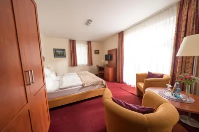 Ein Bett oder Betten in einem Zimmer der Unterkunft Hotel & Café Strandeck
