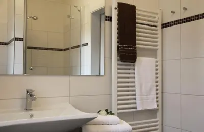 Ein Badezimmer in der Unterkunft Hotel & Café Strandeck