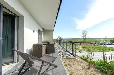 Ein Balkon oder eine Terrasse in der Unterkunft Waterkant