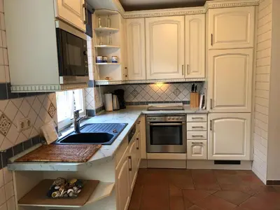 Küche/Küchenzeile in der Unterkunft Hus Sünnschien Wg 1