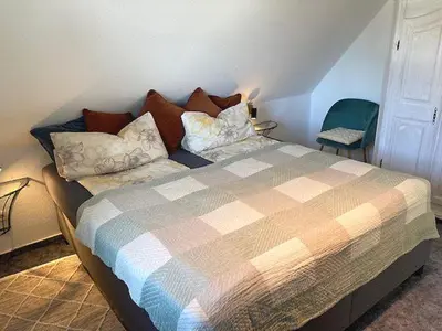 Ein Bett oder Betten in einem Zimmer der Unterkunft Ferienhaus Prerow