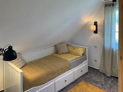 Ein Bett oder Betten in einem Zimmer der Unterkunft Ferienhaus Prerow