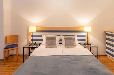 Ein Bett oder Betten in einem Zimmer der Unterkunft Albatros