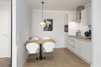 Küche/Küchenzeile in der Unterkunft 5-Sterne-Ferienwohnung - Windflüchter an der Seebrücke