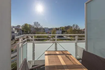 Ein Balkon oder eine Terrasse in der Unterkunft 5-Sterne-Ferienwohnung - Windflüchter an der Seebrücke