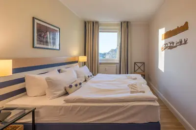 Ein Bett oder Betten in einem Zimmer der Unterkunft Kranichtanz