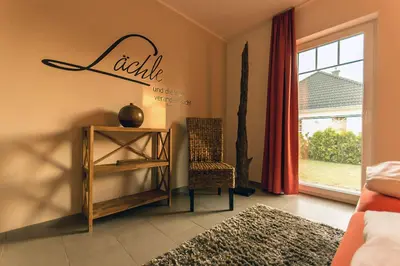 Ein Bett oder Betten in einem Zimmer der Unterkunft Hus Rusty