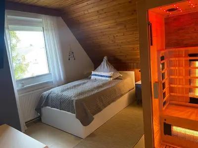 Ein Bett oder Betten in einem Zimmer der Unterkunft Ankerplatz 2