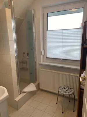 Ein Badezimmer in der Unterkunft Ankerplatz 2