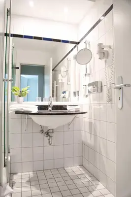 Ein Badezimmer in der Unterkunft Apartment mit maritimem Flair - 1 Minute zu Strand & Seebrücke