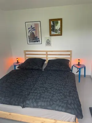 Ein Bett oder Betten in einem Zimmer der Unterkunft Ferienhaus Aalglatt am Deich, 250 m zum Strand