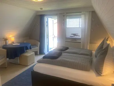 Ein Bett oder Betten in einem Zimmer der Unterkunft Ankerplatz 1