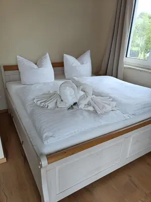 Ein Bett oder Betten in einem Zimmer der Unterkunft Haus Luca Fuhlendorf