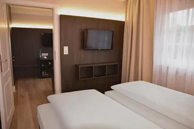 Ein Bett oder Betten in einem Zimmer der Unterkunft Fisher's Inn