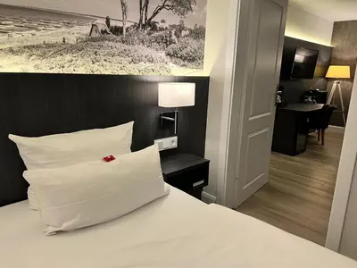Ein Bett oder Betten in einem Zimmer der Unterkunft Fisher's Inn