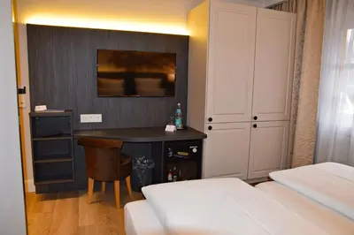 Ein Bett oder Betten in einem Zimmer der Unterkunft Fisher's Inn