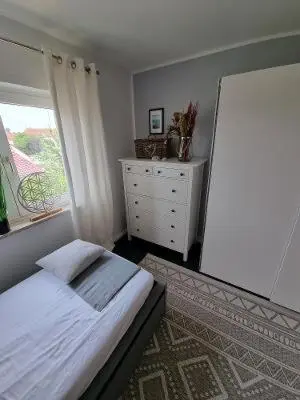 Ein Bett oder Betten in einem Zimmer der Unterkunft Haus Frida
