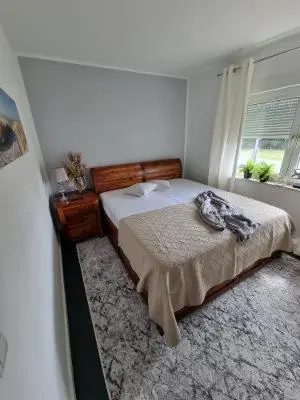Ein Bett oder Betten in einem Zimmer der Unterkunft Haus Frida