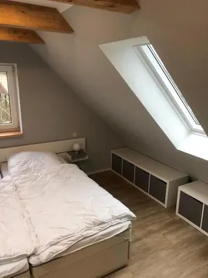 Ein Bett oder Betten in einem Zimmer der Unterkunft Ferienwohnung am Storchnest
