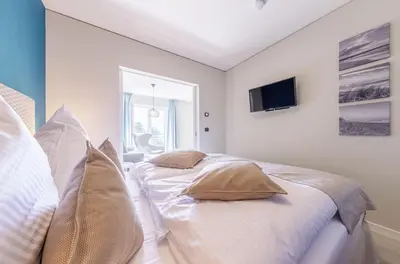 Ein Bett oder Betten in einem Zimmer der Unterkunft Boddenflair