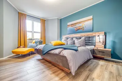 Ein Bett oder Betten in einem Zimmer der Unterkunft Strandstraße 16 - Wohnung 3