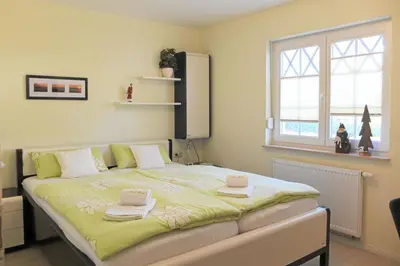 Ein Bett oder Betten in einem Zimmer der Unterkunft Villa Sola Bona Fewo 1